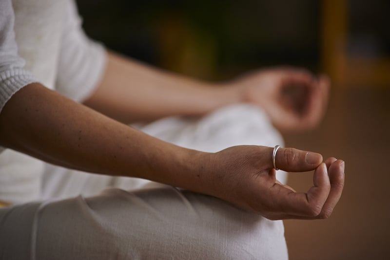 Woman meditating in nature